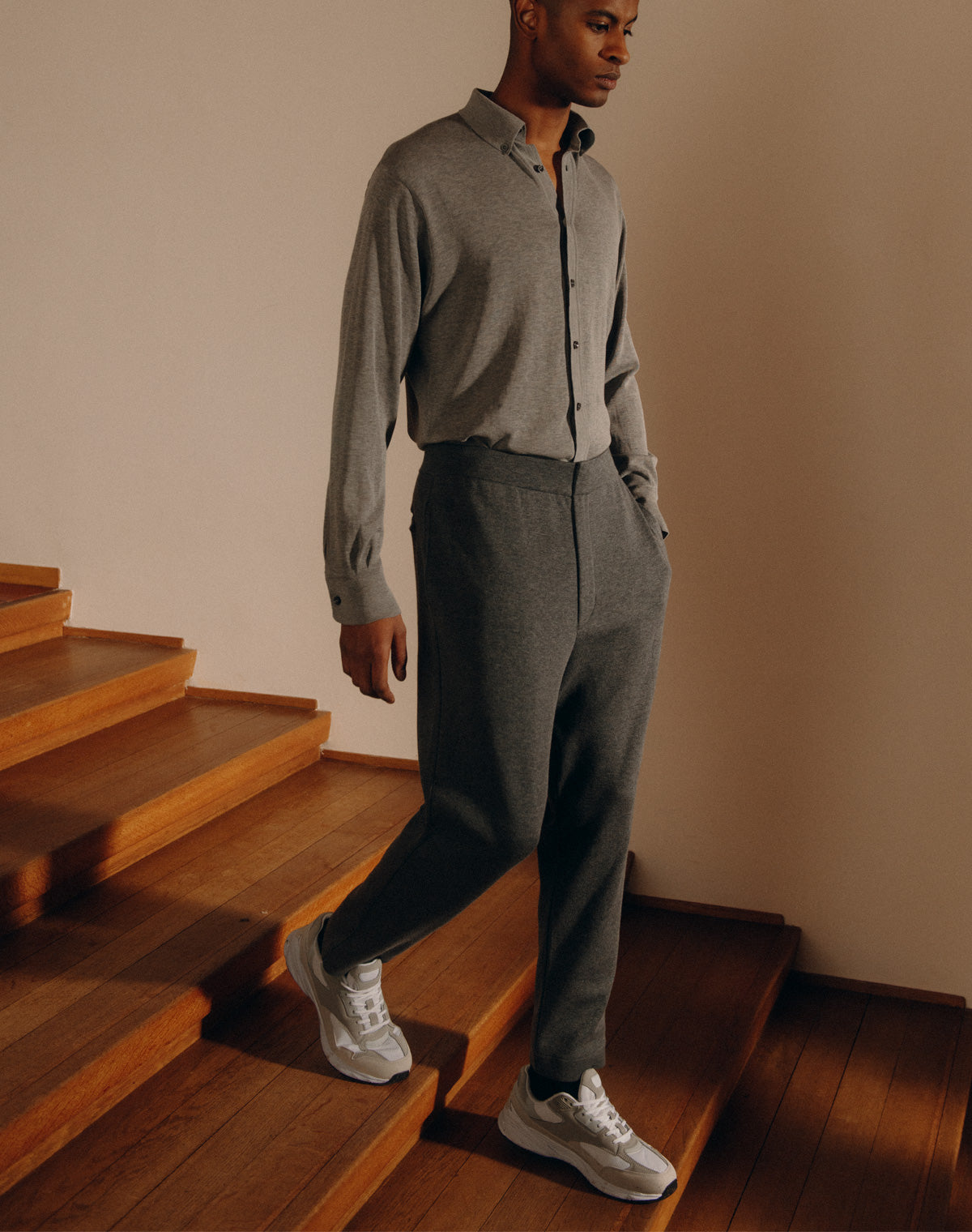 Model wearing the Men's Flat Front Knit Pant by Serino